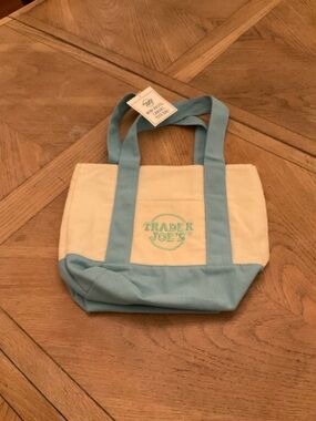 NWT. Trader Joe's Cream and Light Blue Canvas Tote